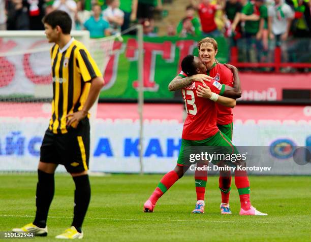 Roman Pavlyuchenko and Victor Obinna of FC Lokomotiv Moscow celebrate a goal during the Russian Premier League match between FC Lokomotiv Moscow and...