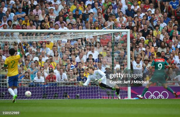 Oribe Peralta of Mexico scores their second goal during the Men's Football Final between Brazil and Mexico on Day 15 of the London 2012 Olympic Games...