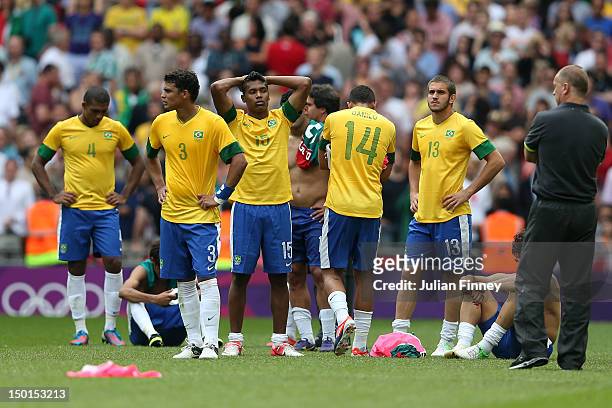 Brazil players show their dejection after the Men's Football Final between Brazil and Mexico on Day 15 of the London 2012 Olympic Games at Wembley...