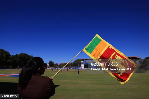 Fan waves a Sri Lanka flag during the ICC Men's Cricket World Cup Qualifier Zimbabwe 2023 match between the Sri Lanka and Ireland at Queen’s Sports...