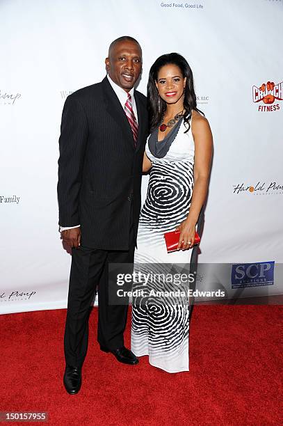 Former NFL player Tim Brown and his wife Sherice Brown arrive at the 12th Annual Harold Pump Foundation Gala on August 10, 2012 in Los Angeles,...