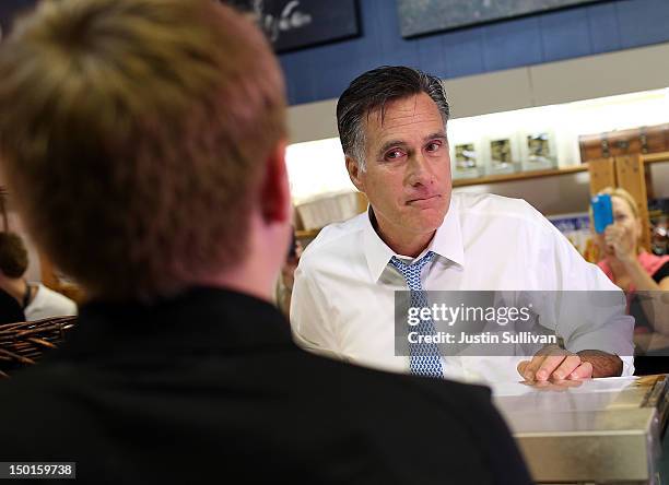 Republican presidential candidate and former Massachusetts Gov. Mitt Romney purchases pies at Homemades by Suzanne during a campaign stop August 11,...