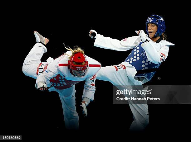 Suvi Mikkonen of Finland competes against Diana Lopez of the United States during the Women's -57kg Taekwondo repechage on Day 13 of the London 2012...
