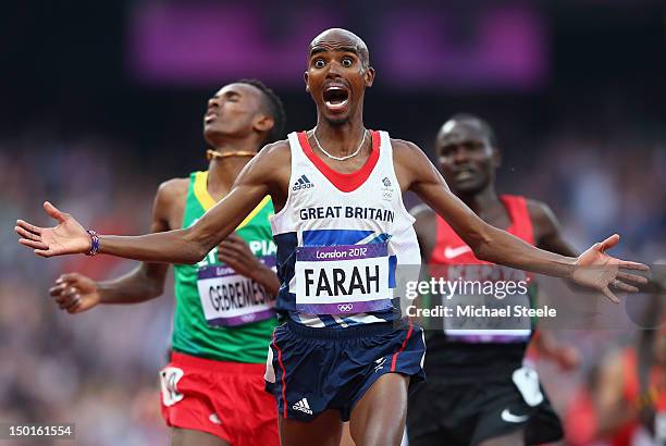 Mohamed Farah of Great Britain celebates as he crosses the finish line to win gold ahead of Dejen Gebremeskel of Ethiopia and Thomas Pkemei Longosiwa...