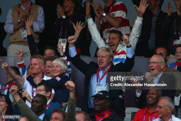 David Beckham and Paul Deighton, chief executive of LOCOG, mayor of London Boris Johnson and Sir Menzies Campbell celebrate as Mohamed Farah of Great...
