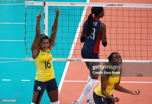 Fernanda Rodrigues and Fabiana Claudino of Brazil reacts against United States during the Women's Volleyball gold medal match on Day 15 of the London...