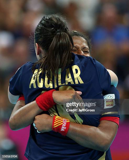 Macarena Aguilar Diaz and Marta Mangue Gonzalez of Spain celebrate after defeating South Korea in the Women's Handball Bronze Medal Match on Day 15...