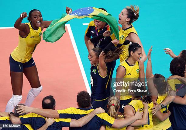 Fabiana Oliveira, Fabiana Claudino and Brazil react after defeating the United States to win the Women's Volleyball gold medal match on Day 15 of the...