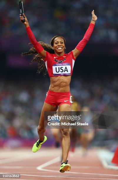 Sanya Richards-Ross of the United States celebrates as she crosses the finish line to win gold in the Women's 4 x 400m Relay Final on Day 15 of the...