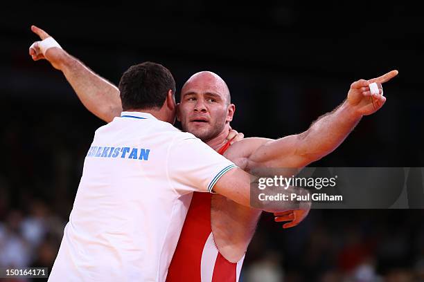 Artur Taymazov of Uzbekistan celebrates a gold medal in the Men's Freestyle 120 kg Wrestling on Day 15 of the London 2012 Olympic Games at ExCeL on...