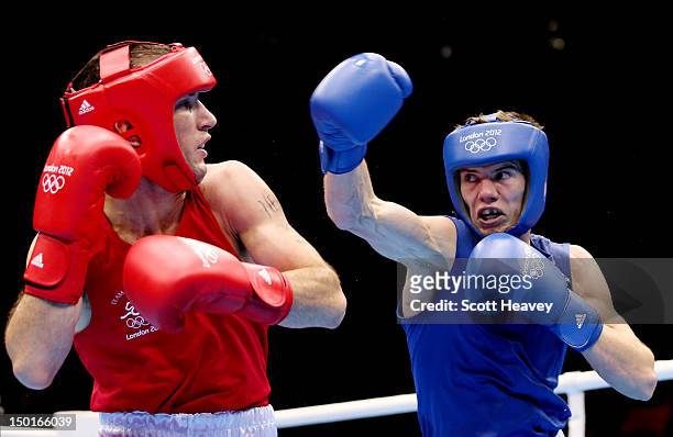 Luke Campbell of Great Britain throws a punch against John Joe Nevin of Ireland during the Men's Bantam Boxing final bout on Day 15 of the London...