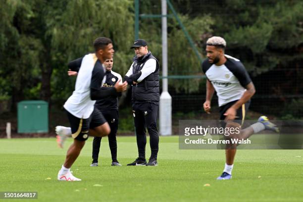 Assistant Head Coach Jesus Perez and Head Coach Mauricio Pochettino of Chelsea during a training session at Chelsea Training Ground on July 4, 2023...