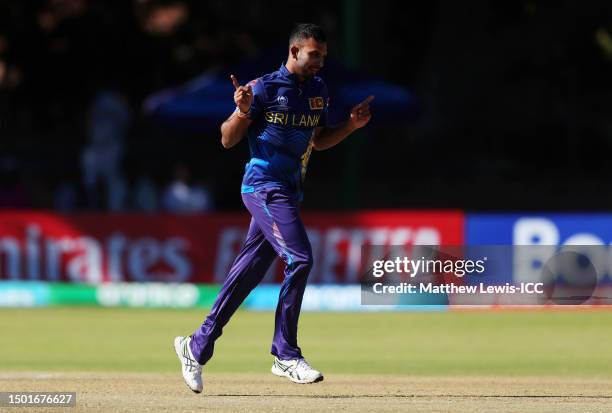 Dasun Shanaka of Sri Lanka celebrates after bowling Lorcan Tucker of Ireland during the ICC Men's Cricket World Cup Qualifier Zimbabwe 2023 match...