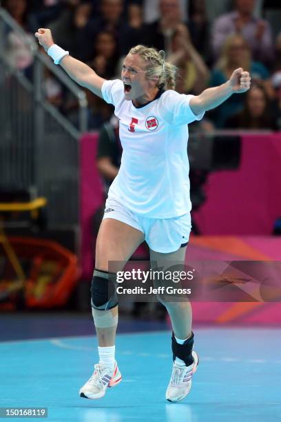 Ida Alstad of Norway celebrates after a point against Montenegro during the Women's Handball Gold Medal Match on Day 15 of the London 2012 Olympics...