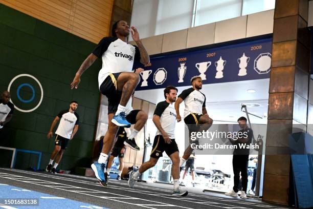 Raheem Sterling, Ben Chilwell and Reece James of Chelsea during a gym training session at Chelsea Training Ground on July 4, 2023 in Cobham, England.