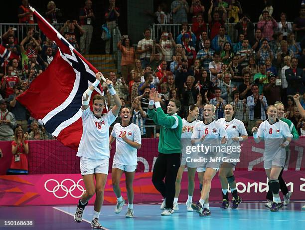 Katrine Lunde Haraldsen of Norway celebrates with her teammates after winning the gold medal against Montenegro in the Women's Handball Final Match...