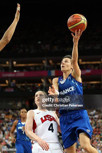 Celine Dumerc of France goes up for a shot against Lindsay Whalen of United States in the third quarter during the Women's Basketball Gold Medal game...