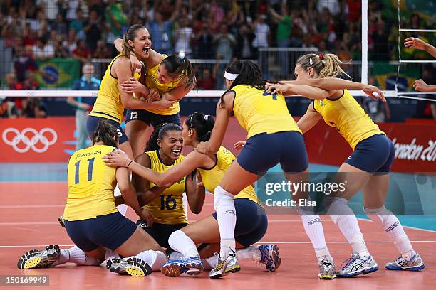 Brazil celebrates after defeating the United States to win the Women's Volleyball gold medal match on Day 15 of the London 2012 Olympic Games at...