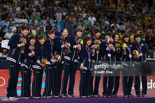 Japan stands on the podium with their bronze medals after the Women's Volleyball gold medal match on Day 15 of the London 2012 Olympic Games at Earls...