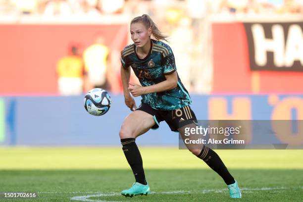 Sarai Linder of Germany controls the ball during the Women's international friendly between Germany and Vietnam at Stadion Am Bieberer Berg on June...