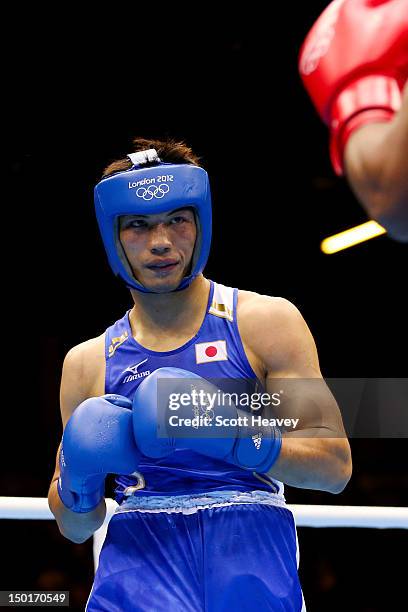 Ryota Murata of Japan looks on while fighting against Esquiva Falcao Florentino of Brazil during the Men's Middle Boxing final bout on Day 15 of the...
