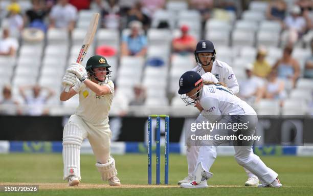 Beth Mooney of Australia hits past England fielder Tammy Beaumont during day four of the LV= Insurance Women's Ashes Test match between England and...