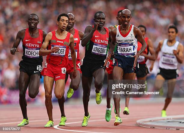 Isiah Kiplangat Koech of Kenya, Abdalaati Iguider of Morocco, Thomas Pkemei Longosiwa of Kenya and Mohamed Farah of Great Britain competes in the...