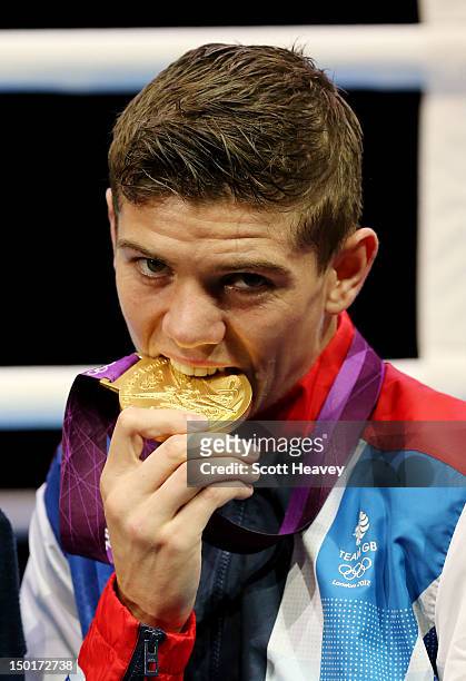 Gold medalist Luke Campbell of Great Britain celebrates after the medal ceremony for the Men's Bantam Boxing final bout on Day 15 of the London 2012...