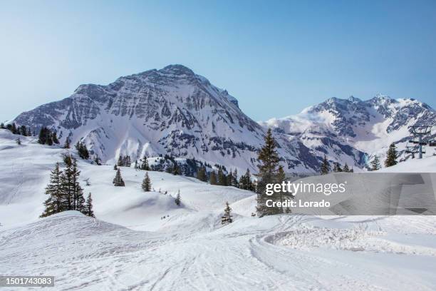 beautiful austrian mountainous countryside landscape view in the snow - tyrol state austria stock pictures, royalty-free photos & images