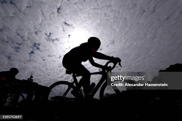 Veronika Mackova of Slovakia competes at the Brandenburg Gate in the 10k Road Race Cycling Competition at Stasse des 17 Juni during day nine of...