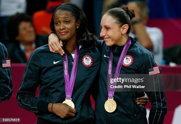 Swin Cash and Diana Taurasi of United States celebrate after defeating France 86-50 to win the gold medal in the Women's Basketball gold medal game...