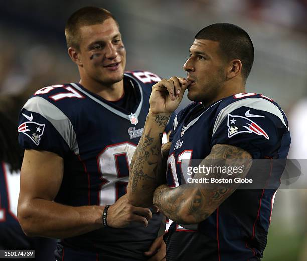 New England Patriots tight end Rob Gronkowski and New England Patriots tight end Aaron Hernandez on the sidelines during the second quarter of a...