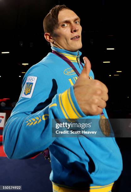 Gold medalist Oleksandr Usyk of Ukraine celebrates after the medal ceremony for the Men's Heavy Boxing final bout on Day 15 of the London 2012...