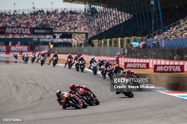 Brad Binder of South Africa and Red Bull KTM Factory Racing leads the race in front of Francesco Bagnaia of Italy and Ducati Lenovo Team and Marco...