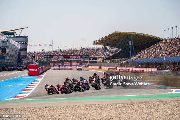 Race start - MotoGP riders at turn one during the Race of the MotoGP Motul TT Assen at TT Circuit Assen on June 25, 2023 in Assen, Netherlands.