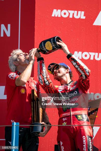 Luigi Dall'Igna tastes the Prosecco of Francesco Bagnaia of Italy and Ducati Lenovo Team during the Race of the MotoGP Motul TT Assen at TT Circuit...