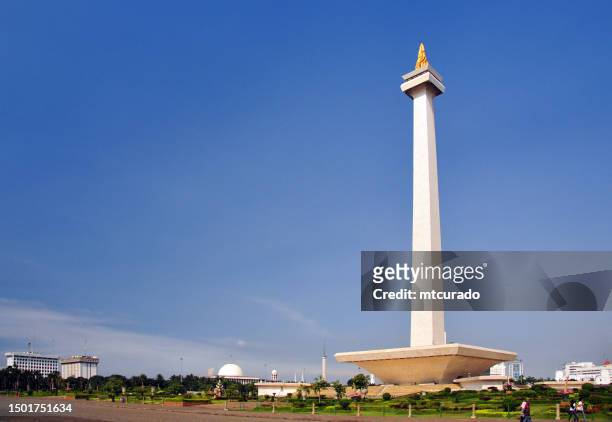 merdeka square and the national monument - monas tower, the center of jakarta, indonesia - jakarta stock pictures, royalty-free photos & images