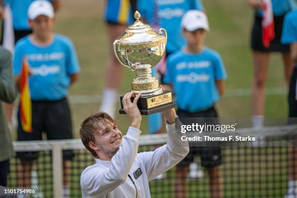 Alexander Bublik of Kazakhstan celebrates holding the tournaments cup after winning the final match against Andrey Rublev of Russia during day nine...