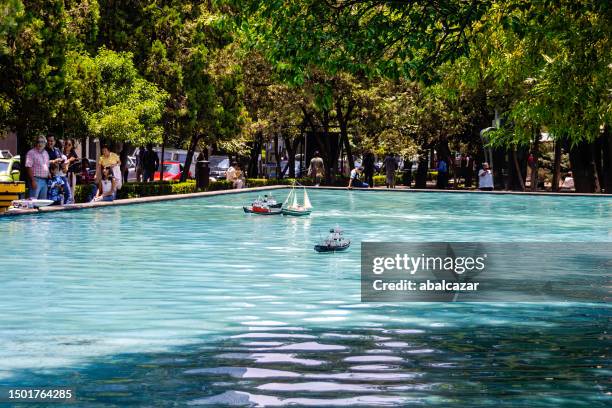 weekend activities at lincoln park in mexico city - remote control car stock pictures, royalty-free photos & images