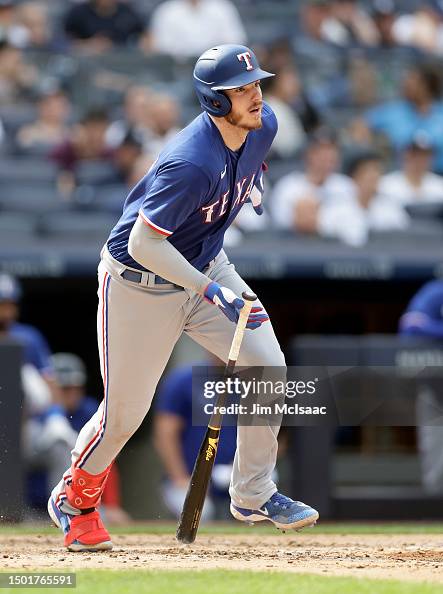 Texas Ranger Heim Jonah Heim of the Texas Rangers follows through on his fourth inning ...