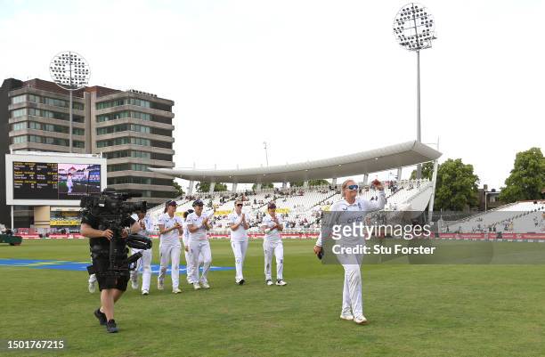 England bowler Sophie Ecclestone takes the applause as she leaves the field after finishing with 5 wickets and ten wickets in the match during day...
