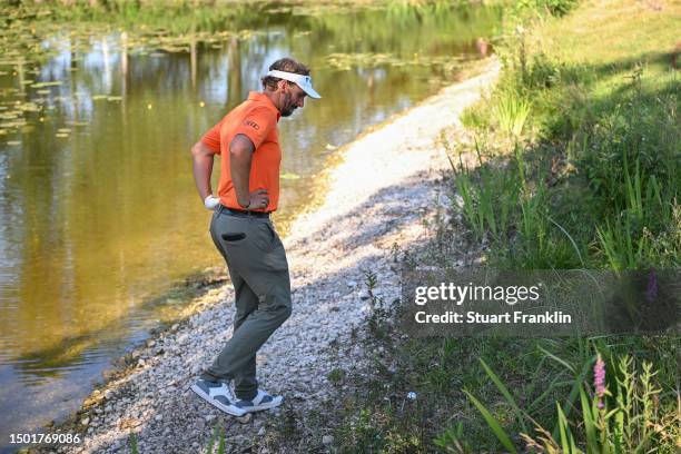 Joost Luiten of The Netherlands prepares to play on the 18th hole during Day Four of the BMW International Open at Golfclub Munchen Eichenried on...