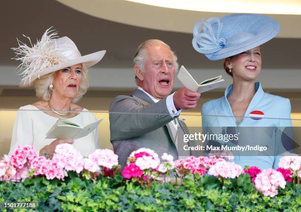 Queen Camilla, King Charles III and Lady Gabriella Windsor watch the racing from the Royal Box as they attend day 5 of Royal Ascot 2023 at Ascot...