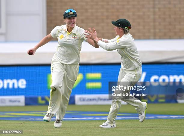 Australia fielder Kim Garth celebrates after catching out England batter Natalie Sciver-Brunt for 0 during day four of the LV= Insurance Women's...