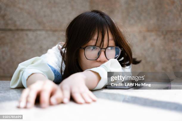 an anxious and depressed asian woman - blank expression stock pictures, royalty-free photos & images