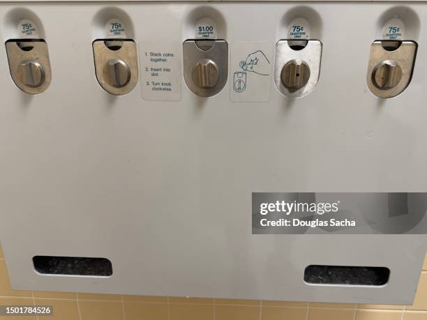 restroom coin vending machine for prophylactic condoms - transdermal stock pictures, royalty-free photos & images