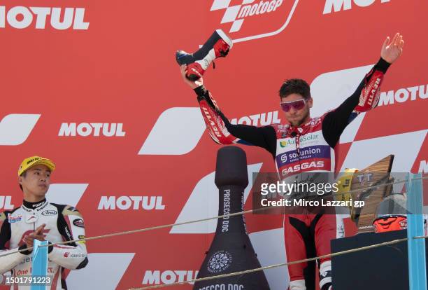 Jake Dixon of Great Britain and GasGas Aspar Team celebrates the victory on the podium at the end of the Moto2 race during the MotoGP of Netherlands...