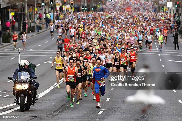 Participants make their way up William street during the 2012 City2Surf run on August 12, 2012 in Sydney, Australia.