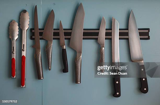 kitchen knives and spoons - magnetwand stock-fotos und bilder