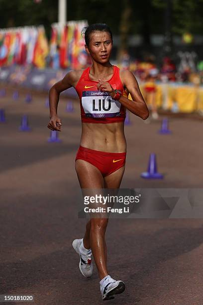 Liu Hong of China races to the finish line during the Women's 20km Walk on Day 15 of the London 2012 Olympic Games on the streets of London on August...
